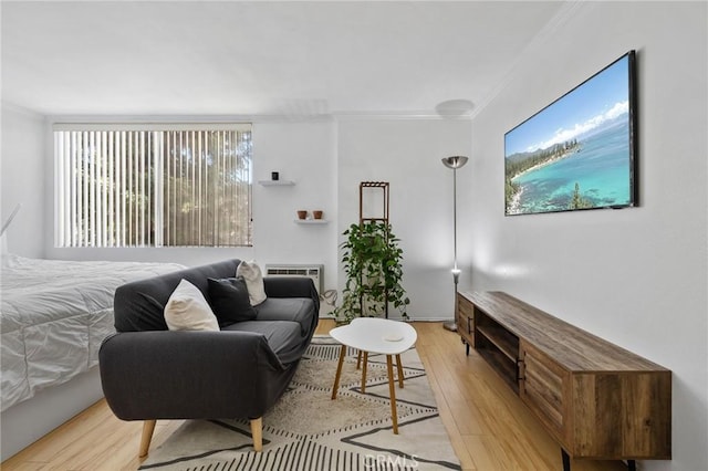 525 S Ardmore Ave Unit 257, Los Angeles, CA 90020 - bedroom with light wood-style floors, crown molding, and a wall mounted AC
