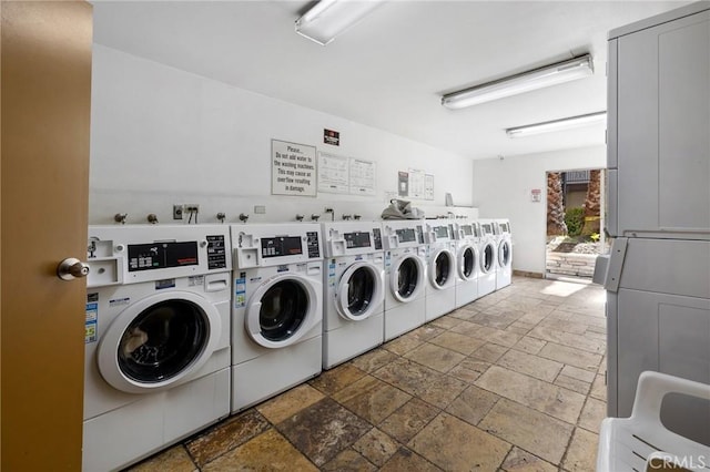525 S Ardmore Ave Unit 257, Los Angeles, CA 90020 - shared laundry featuring stone tile flooring and separate washer and dryer