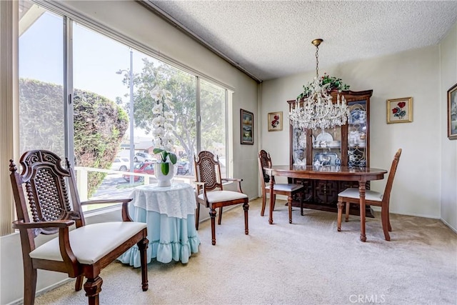 4750 W 191st St, Torrance, CA 90503 - dining space featuring a chandelier, light carpet, and a textured ceiling