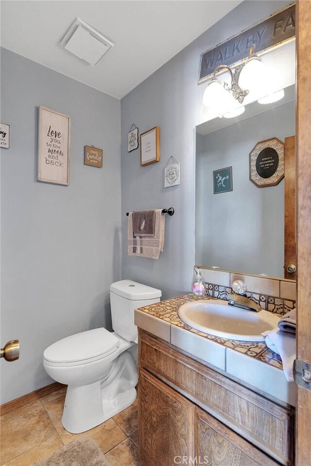19678 Red Feather Rd, Apple Valley, CA 92307 - half bath with vanity and toilet