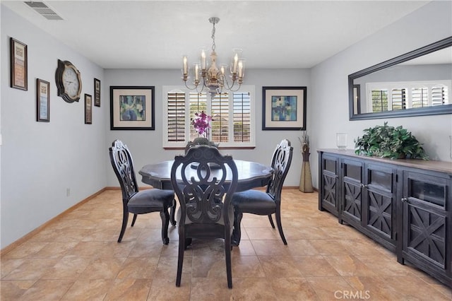 19678 Red Feather Rd, Apple Valley, CA 92307 - dining room with a chandelier and baseboards