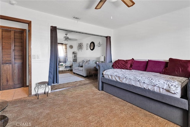 19678 Red Feather Rd, Apple Valley, CA 92307 - carpeted bedroom with a ceiling fan
