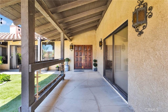 19678 Red Feather Rd, Apple Valley, CA 92307 - entrance to property with stucco siding and a porch