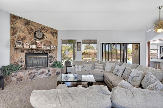 19678 Red Feather Rd, Apple Valley, CA 92307 - carpeted living room featuring ceiling fan and a fireplace