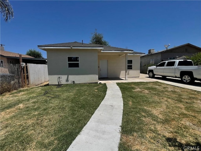 1012 Feliz Dr, Bakersfield, CA 93307 - view of front of home featuring stucco siding