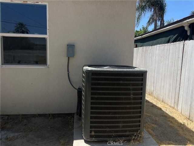 1012 Feliz Dr, Bakersfield, CA 93307 - exterior view of a central air condition unit and stucco siding
