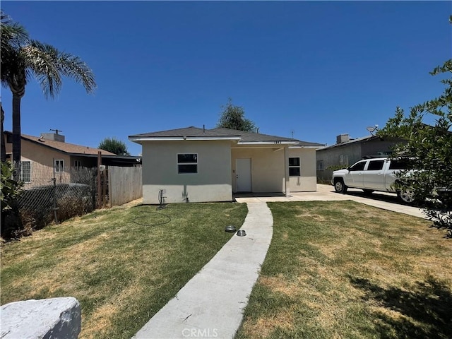 1012 Feliz Dr, Bakersfield, CA 93307 - view of front of house with stucco siding