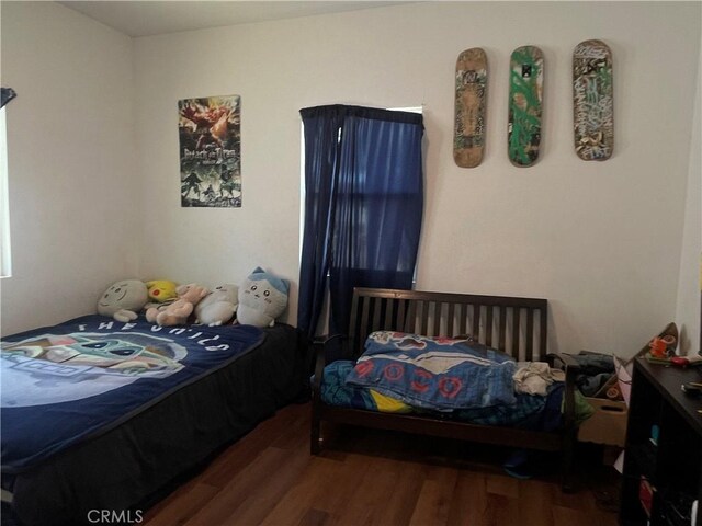 1012 Feliz Dr, Bakersfield, CA 93307 - bedroom with wood finished floors