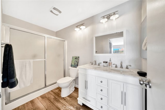 24812 Leto Cir, Mission Viejo, CA 92691 - full bath featuring wood finished floors, double vanity, and a stall shower