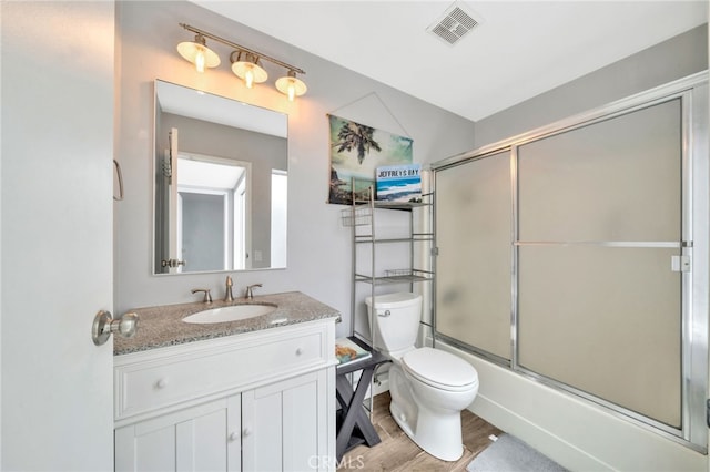24812 Leto Cir, Mission Viejo, CA 92691 - bathroom with vanity, shower / bath combination with glass door, and wood finished floors