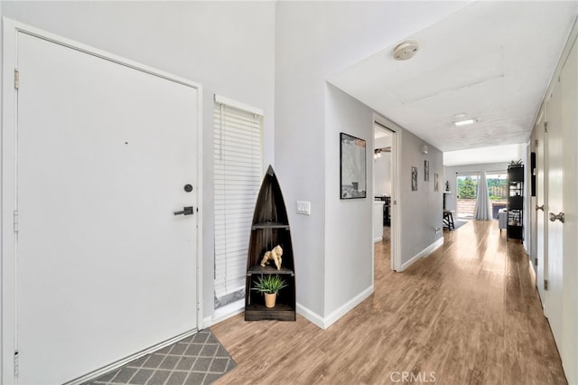24812 Leto Cir, Mission Viejo, CA 92691 - foyer entrance featuring light wood-type flooring and baseboards