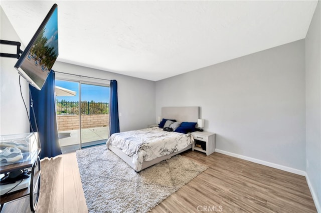 24812 Leto Cir, Mission Viejo, CA 92691 - bedroom with access to outside and wood finished floors