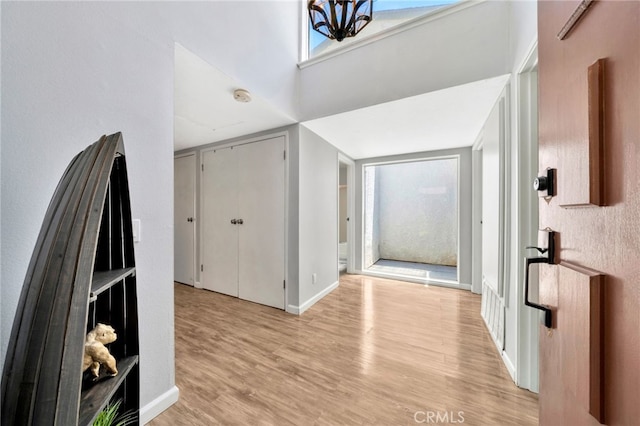 24812 Leto Cir, Mission Viejo, CA 92691 - entryway with light wood-style floors and a chandelier