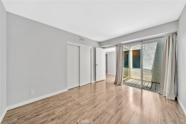 24812 Leto Cir, Mission Viejo, CA 92691 - empty room featuring wood finished floors and baseboards