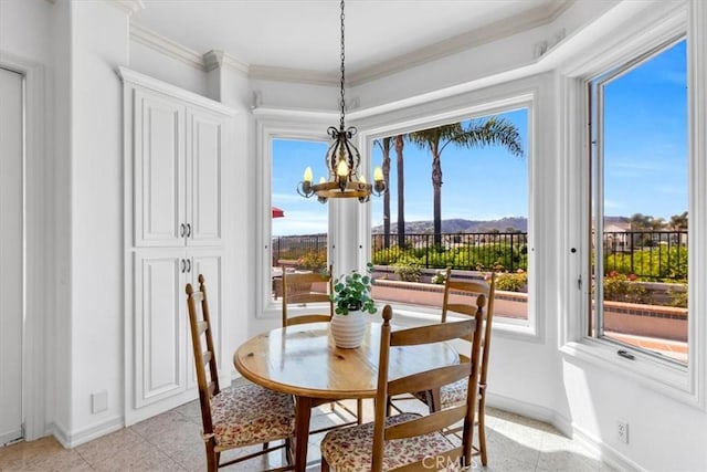 5 Marbella, Dana Point, CA 92629 - dining space featuring a chandelier, healthy amount of natural light, ornamental molding, and a mountain view