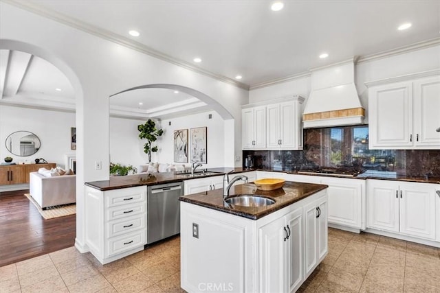 5 Marbella, Dana Point, CA 92629 - kitchen with stainless steel appliances, custom range hood, arched walkways, recessed lighting, and ornamental molding