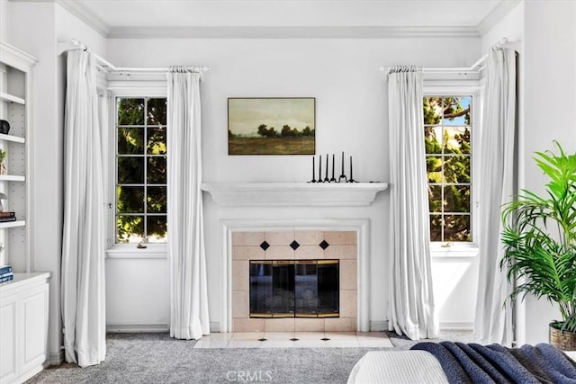 5 Marbella, Dana Point, CA 92629 - carpeted living area with a tiled fireplace, plenty of natural light, and crown molding