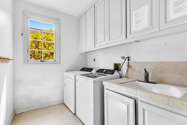 5 Marbella, Dana Point, CA 92629 - washroom featuring cabinet space, washer and clothes dryer, and light tile patterned floors