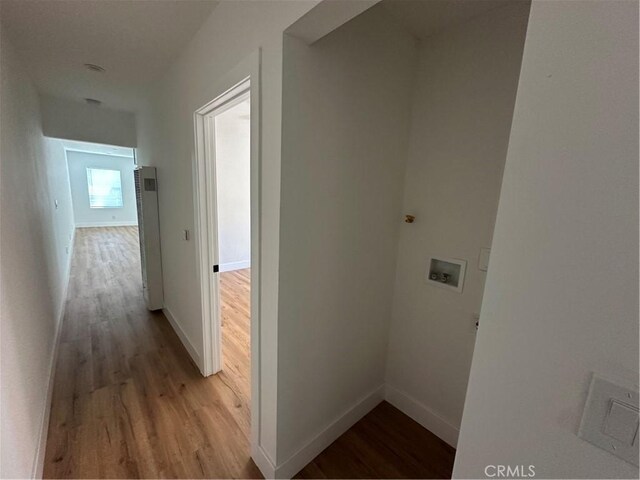 1253 W 65th St, Los Angeles, CA 90044 - laundry area featuring wood finished floors and washer hookup