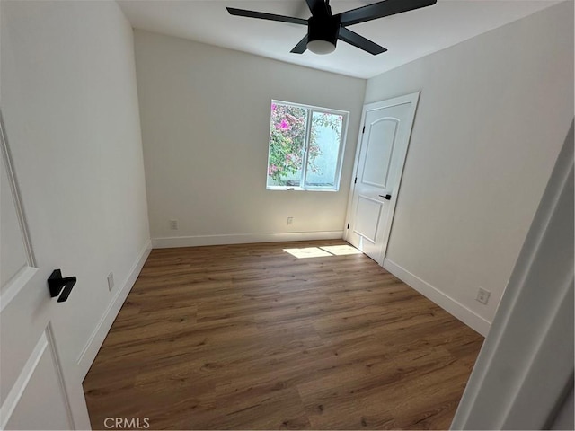 1253 W 65th St, Los Angeles, CA 90044 - unfurnished bedroom with wood finished floors and a ceiling fan