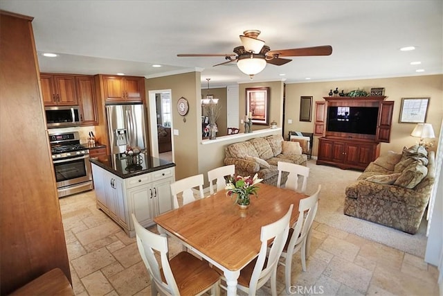 22669 Pamplico Dr, Saugus, CA 91350 - dining space with stone tile floors, recessed lighting, a ceiling fan, and crown molding
