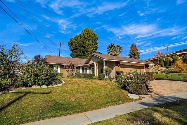 22669 Pamplico Dr, Saugus, CA 91350 - single story home featuring an attached garage, a front yard, and driveway