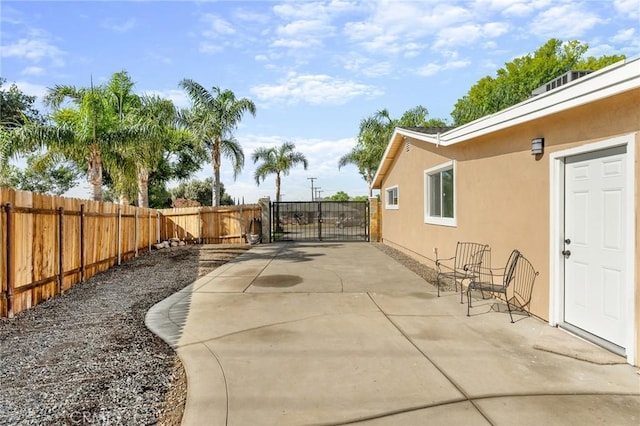 604 Sequoia St, San Bernardino, CA 92407 - fenced backyard featuring a gate and a patio
