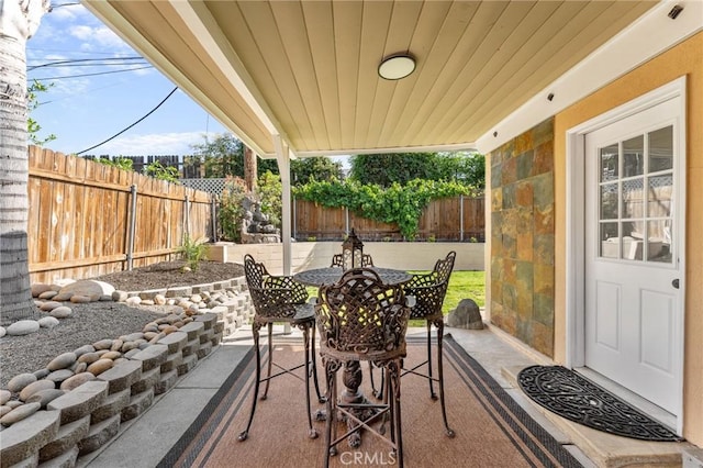 604 Sequoia St, San Bernardino, CA 92407 - fenced backyard featuring a patio area and outdoor dining space
