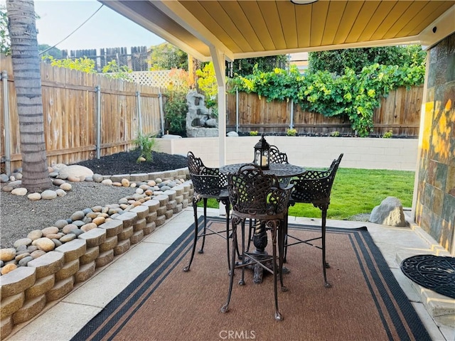 604 Sequoia St, San Bernardino, CA 92407 - fenced backyard with outdoor dining space and a patio area