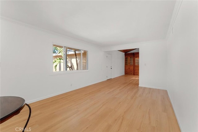 604 Sequoia St, San Bernardino, CA 92407 - unfurnished living room with ornamental molding and light wood-type flooring