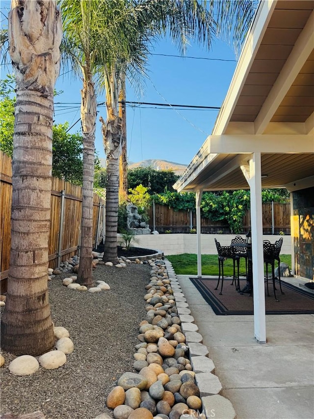 604 Sequoia St, San Bernardino, CA 92407 - fenced backyard with a patio area and outdoor dining space