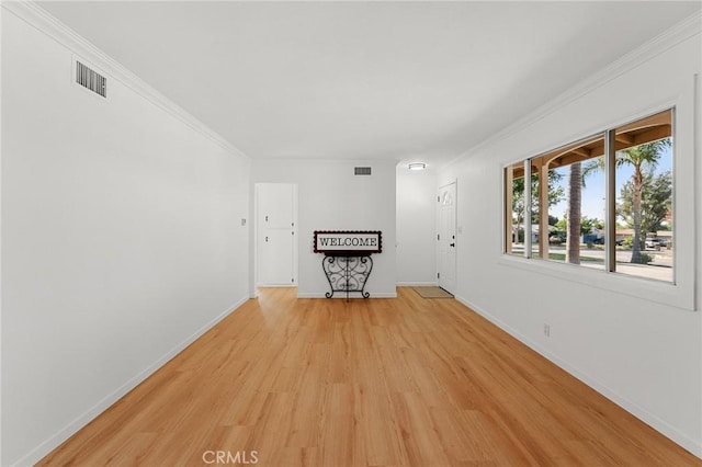 604 Sequoia St, San Bernardino, CA 92407 - spare room with light wood-style floors and ornamental molding