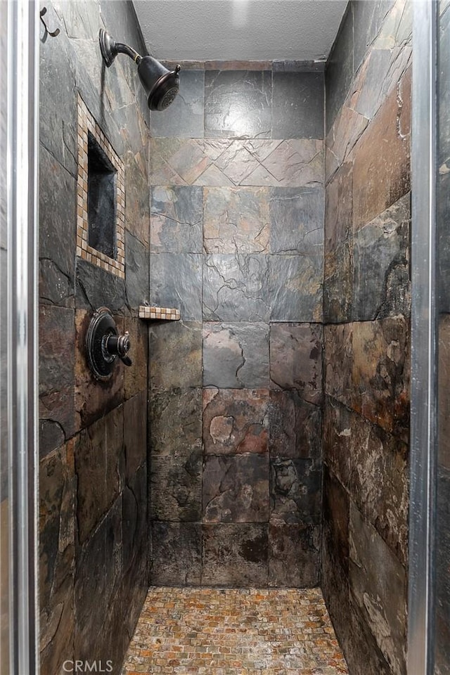 604 Sequoia St, San Bernardino, CA 92407 - bathroom featuring a tile shower