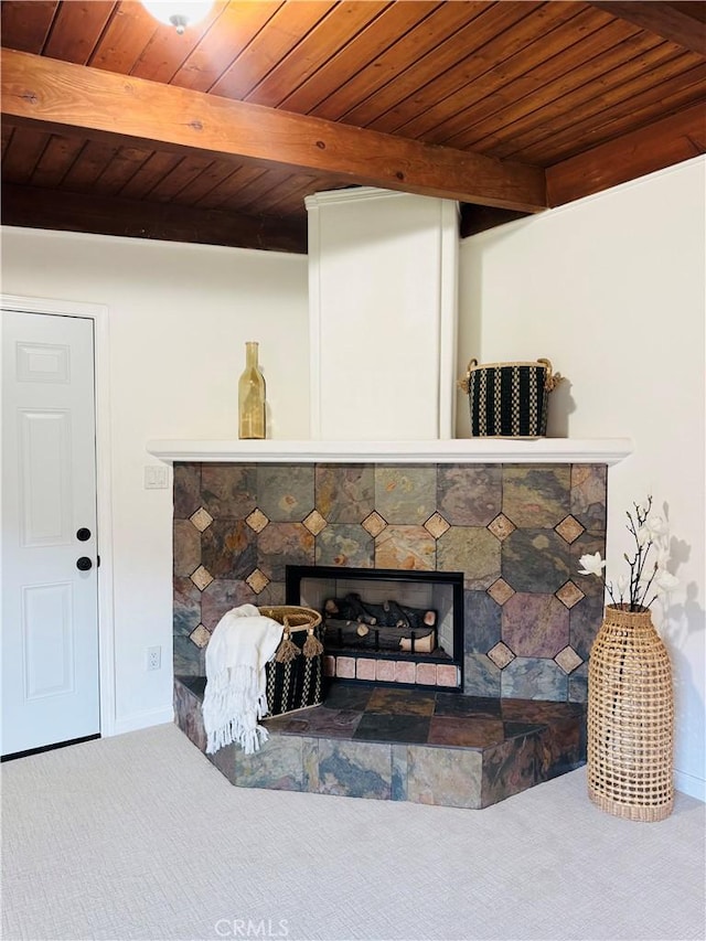 604 Sequoia St, San Bernardino, CA 92407 - detailed view of carpet, a wooden ceiling with exposed beams, and a stone fireplace
