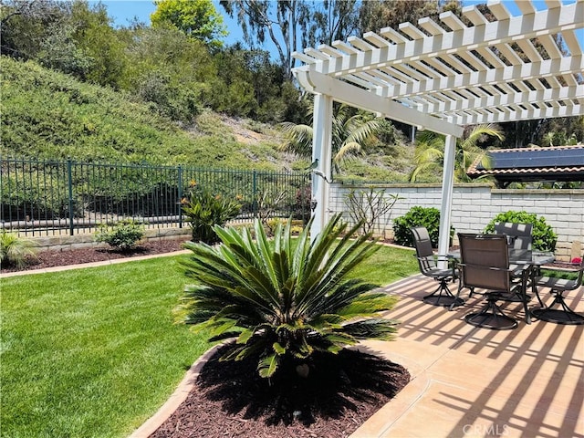 7004 Wildrose Ter, Carlsbad, CA 92011 - fenced backyard featuring outdoor dining space, a pergola, and a patio