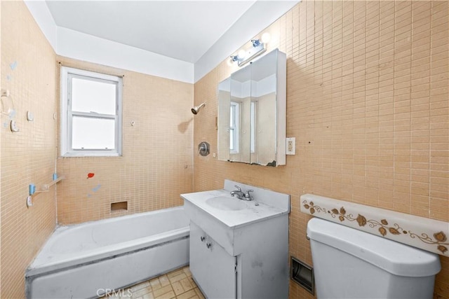 631 N Evergreen St, Burbank, CA 91505 - full bathroom featuring vanity, tile walls, and shower / tub combination