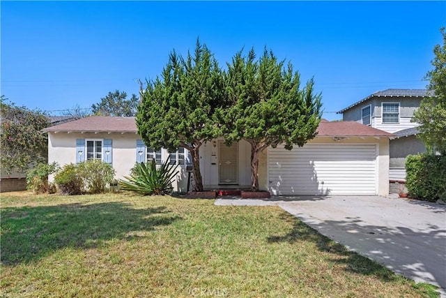 631 N Evergreen St, Burbank, CA 91505 - obstructed view of property with a garage, concrete driveway, stucco siding, and a front yard