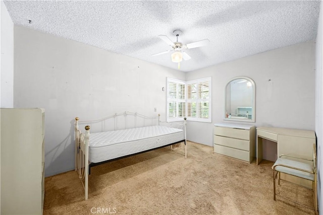 631 N Evergreen St, Burbank, CA 91505 - carpeted bedroom with a textured ceiling and ceiling fan