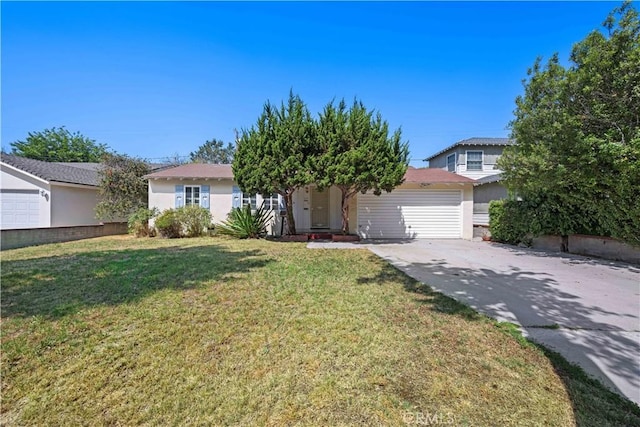 631 N Evergreen St, Burbank, CA 91505 - view of property hidden behind natural elements with concrete driveway, an attached garage, a front yard, and stucco siding