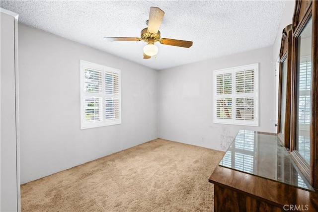 631 N Evergreen St, Burbank, CA 91505 - carpeted empty room with a textured ceiling and a ceiling fan