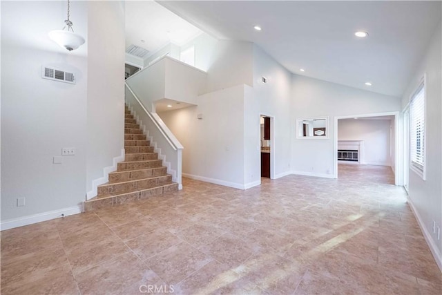 2383 Hampton Ave, Simi Valley, CA 93063 - unfurnished living room with stairway, high vaulted ceiling, recessed lighting, and a fireplace