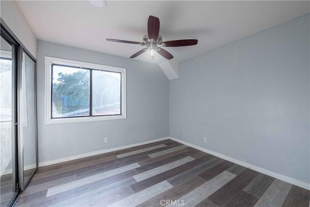 2383 Hampton Ave, Simi Valley, CA 93063 - unfurnished bedroom featuring multiple windows, wood finished floors, ceiling fan, and a closet