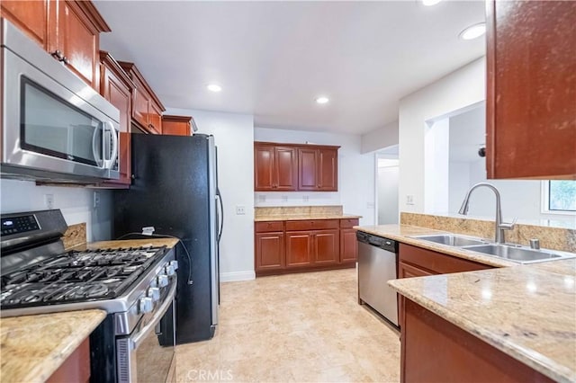 2383 Hampton Ave, Simi Valley, CA 93063 - kitchen with appliances with stainless steel finishes, light stone countertops, and recessed lighting