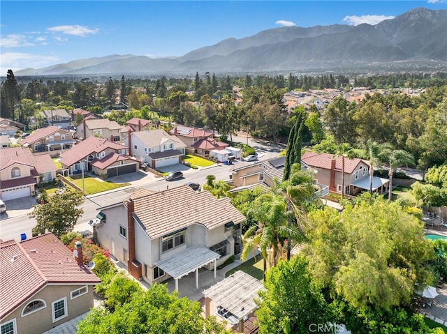 7029 Novara Pl, Rancho Cucamonga, CA 91701 - aerial perspective of suburban area with a mountain backdrop