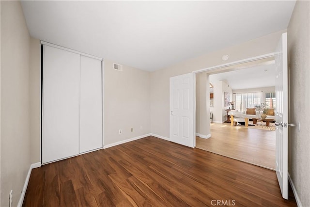 2988 Dartmouth Cir, Corona, CA 92879 - unfurnished bedroom featuring wood finished floors and a closet