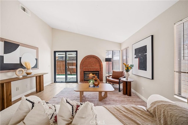 2988 Dartmouth Cir, Corona, CA 92879 - living room with plenty of natural light, vaulted ceiling, and a brick fireplace