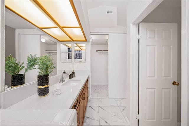 2988 Dartmouth Cir, Corona, CA 92879 - bathroom with marble finish floors, double vanity, and a spacious closet