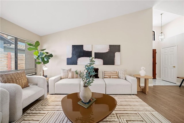 2988 Dartmouth Cir, Corona, CA 92879 - living area featuring wood finished floors and high vaulted ceiling
