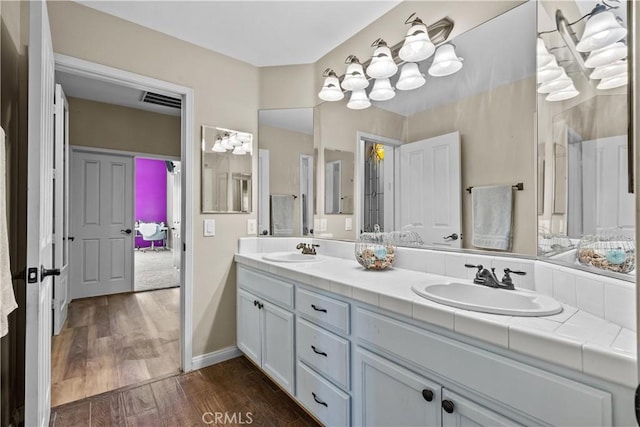15355 Michael Crest Dr, Canyon Country, CA 91387 - full bath with double vanity and wood finished floors
