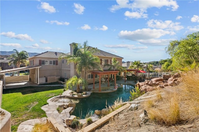 15355 Michael Crest Dr, Canyon Country, CA 91387 - view of pool with a garden pond, a yard, and a patio